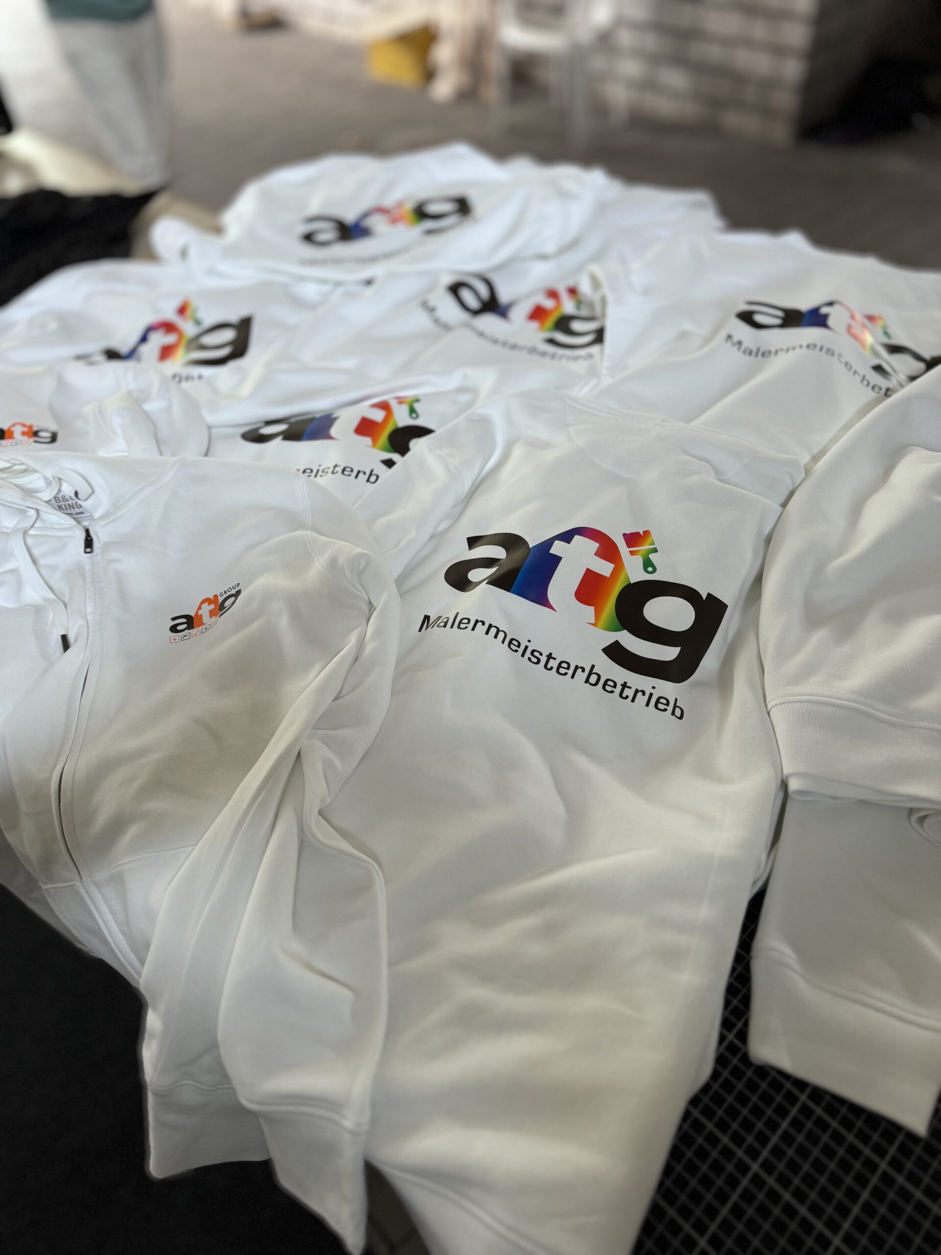 Arbeitskleidung mit Print